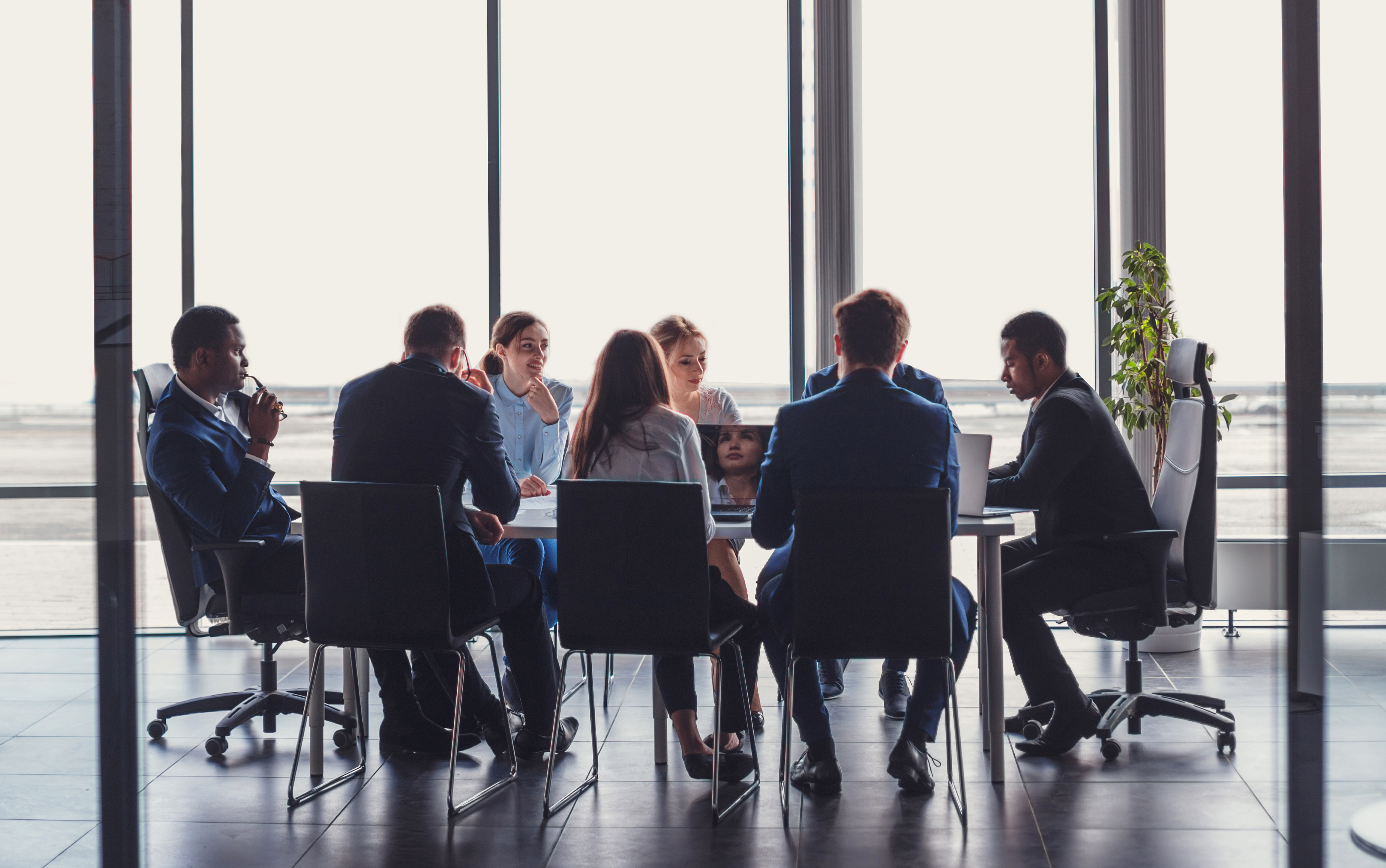Business professionals in conference meeting